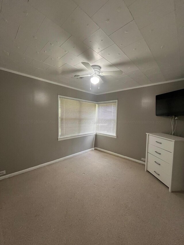 700 S 5th Ave, Jasper, AL 35501 - unfurnished bedroom with carpet flooring, baseboards, crown molding, and a ceiling fan