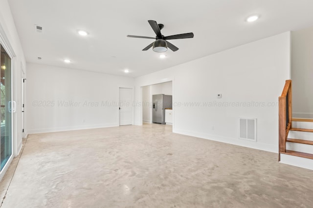 empty room featuring stairway, recessed lighting, concrete floors, ceiling fan, and visible vents