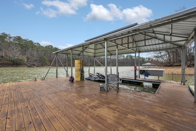 view of dock featuring boat lift and a water view