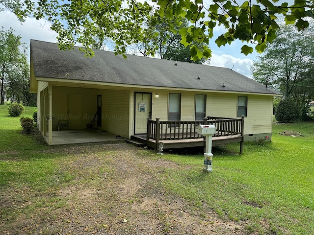 2354 Old Parrish Rd, Parrish, AL 35580 - view of front of property with crawl space, a front yard, a deck, an attached carport, and dirt driveway