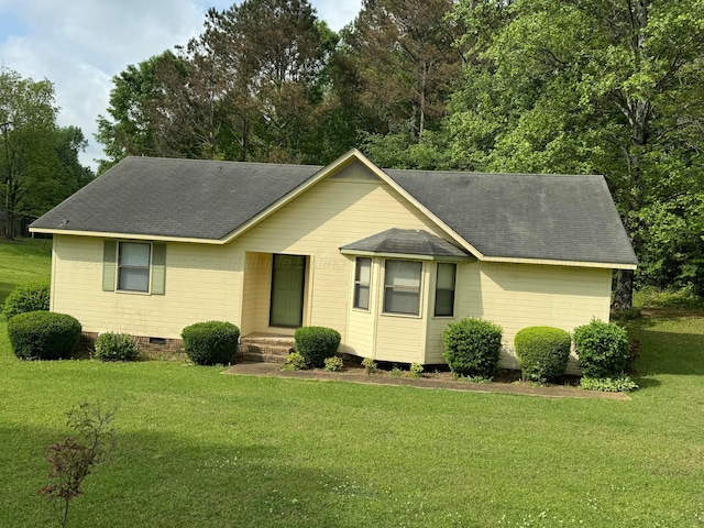2354 Old Parrish Rd, Parrish, AL 35580 - single story home featuring roof with shingles, a front yard, and crawl space