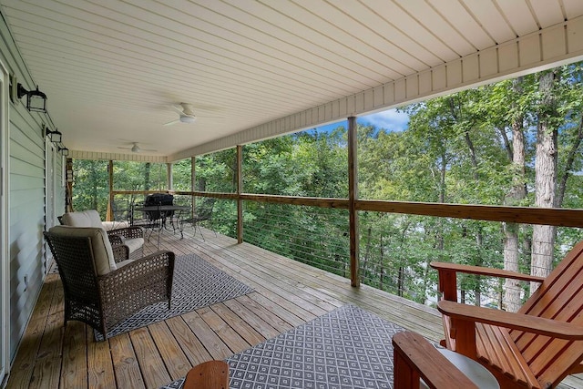 75 County Rd 881, Crane Hill, AL 35053 - wooden deck featuring outdoor dining space, a ceiling fan, and view of scattered trees