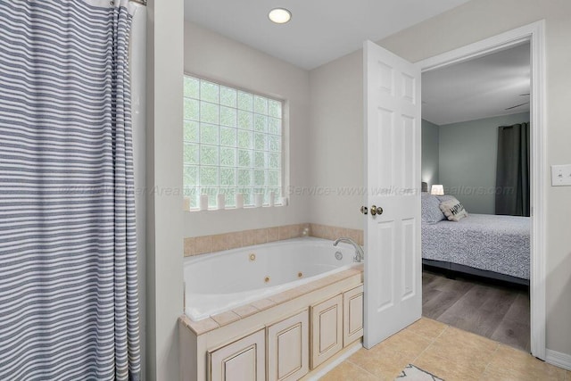 75 County Rd 881, Crane Hill, AL 35053 - ensuite bathroom featuring a whirlpool tub, tile patterned flooring, and recessed lighting