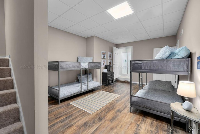 75 County Rd 881, Crane Hill, AL 35053 - bedroom featuring wood finished floors and a drop ceiling