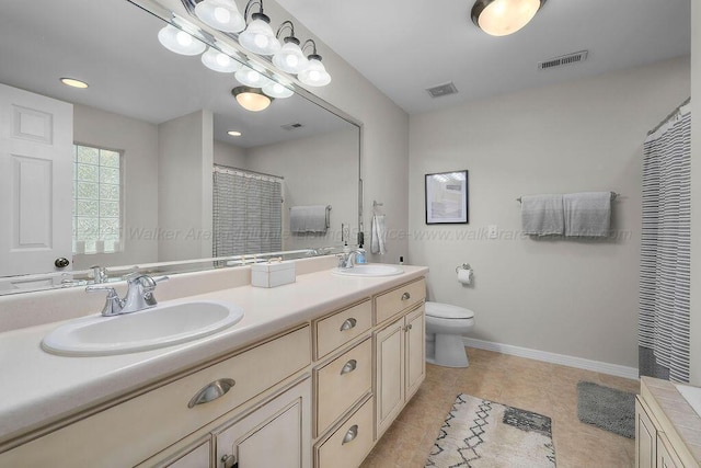 75 County Rd 881, Crane Hill, AL 35053 - full bathroom featuring double vanity, tile patterned flooring, recessed lighting, and curtained shower