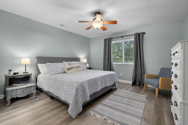 75 County Rd 881, Crane Hill, AL 35053 - bedroom featuring light wood finished floors and a ceiling fan