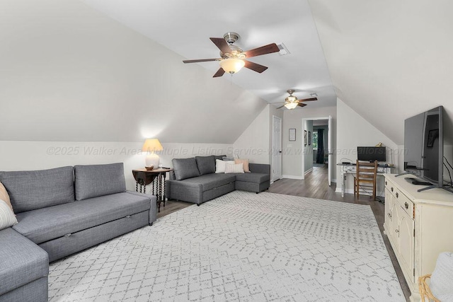 75 County Rd 881, Crane Hill, AL 35053 - living room with a ceiling fan, wood finished floors, and vaulted ceiling