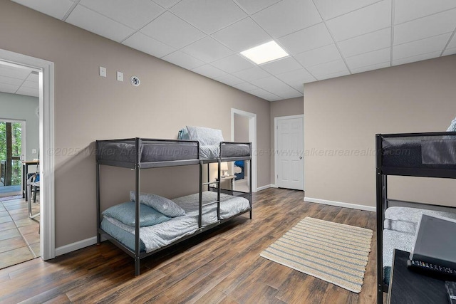 75 County Rd 881, Crane Hill, AL 35053 - bedroom featuring a drop ceiling and wood finished floors