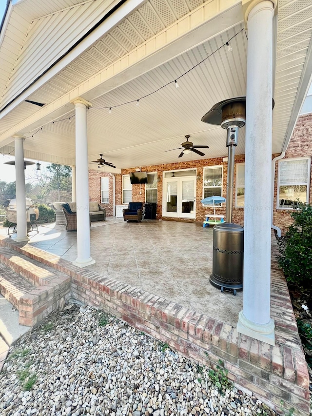 305 Chris Ln, Winfield, AL 35594 - view of patio / terrace with an outdoor living space, ceiling fan, and french doors