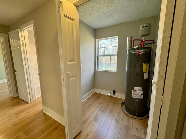 1532 SW Bay Ave, Birmingham, AL 35211 - utility room with electric water heater