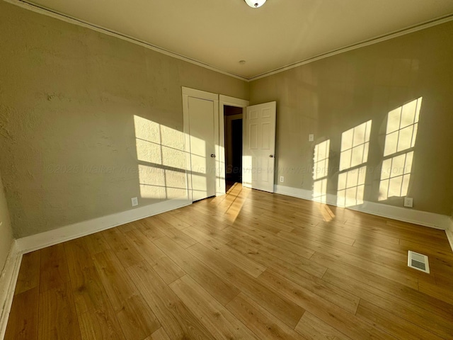 1532 SW Bay Ave, Birmingham, AL 35211 - unfurnished room with wood finished floors and crown molding