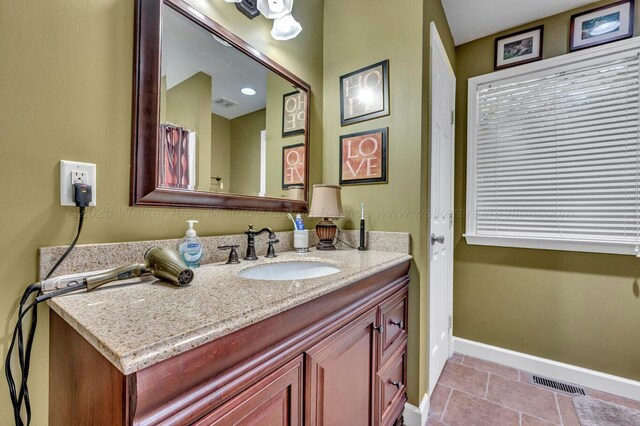 2555 Shady Rd, Adamsville, AL 35005 - full bathroom with vanity and baseboards