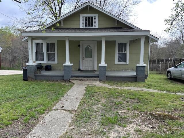 1619 14th Ave, Haleyville, AL 35565 - bungalow-style house featuring covered porch and a front lawn
