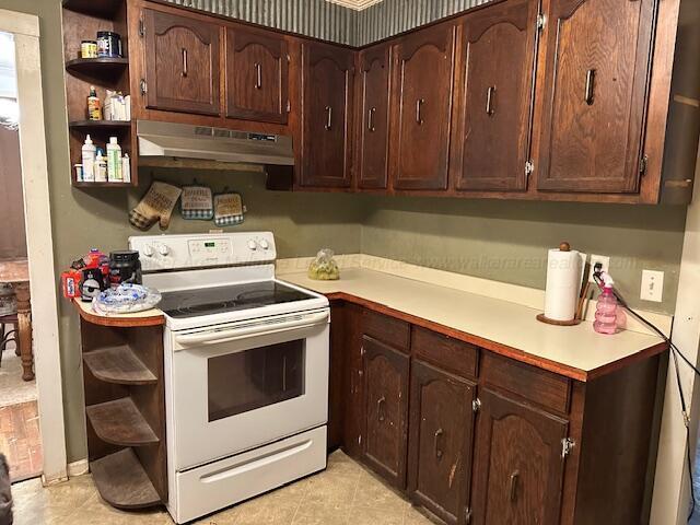 1619 14th Ave, Haleyville, AL 35565 - kitchen featuring open shelves, white electric range, under cabinet range hood, and light countertops