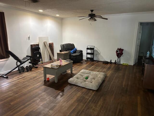1619 14th Ave, Haleyville, AL 35565 - living area with ceiling fan, wood finished floors, recessed lighting, a textured ceiling, and crown molding