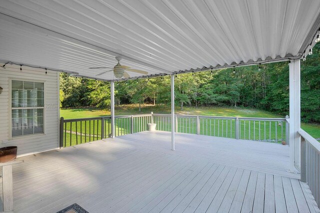 5746 Old Birmingham Hwy, Jasper, AL 35501 - wooden terrace with ceiling fan and a lawn