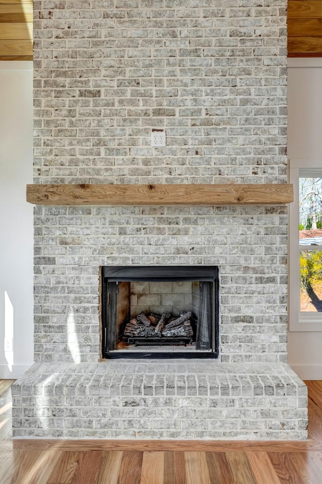 556 Sipsey Rock Rd, Crane Hill, AL 35053 - interior details featuring a fireplace and wood finished floors