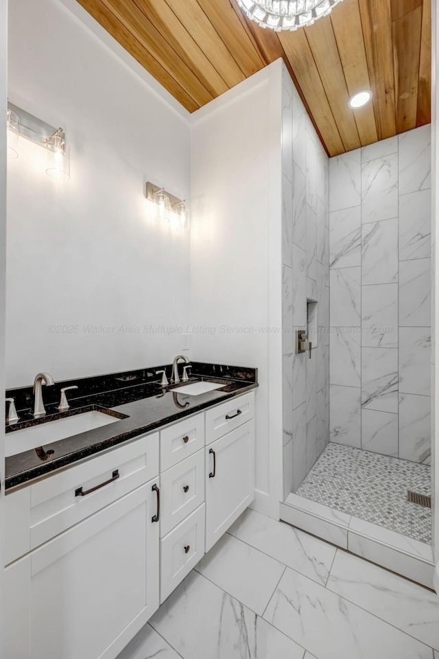 556 Sipsey Rock Rd, Crane Hill, AL 35053 - full bathroom with marble finish floor, tiled shower, wood ceiling, and a sink