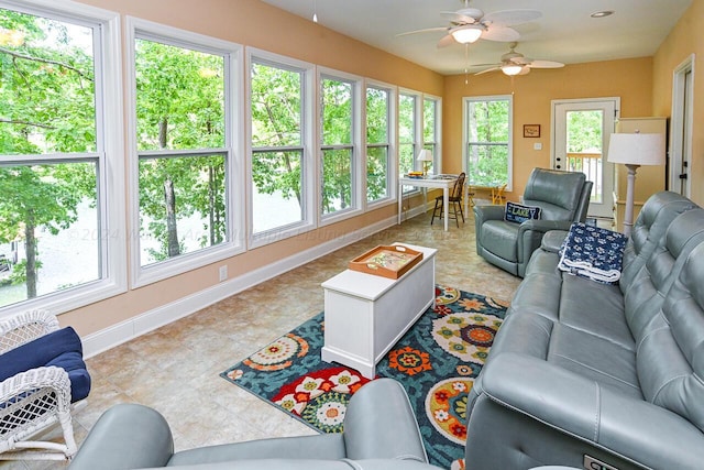 1528 Sipsey Rd, Double Springs, AL 35553 - living room featuring baseboards, tile patterned floors, and a ceiling fan
