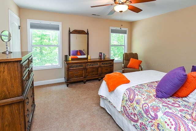 1528 Sipsey Rd, Double Springs, AL 35553 - bedroom featuring baseboards, visible vents, multiple windows, and light carpet