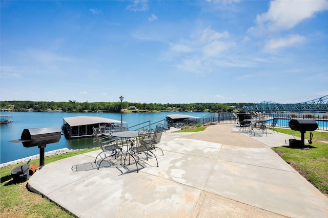 9661 Curry Hwy, Jasper, AL 35503 - view of patio / terrace with fence, area for grilling, a water view, and a dock