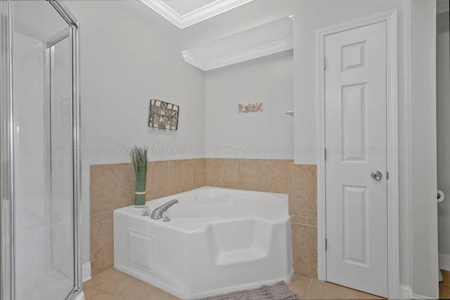 9661 Curry Hwy, Jasper, AL 35503 - bathroom with ornamental molding, tile walls, tile patterned flooring, a shower stall, and a bath