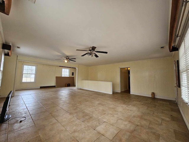 2701 N Airport Rd, Jasper, AL 35504 - unfurnished living room with baseboards, visible vents, and a ceiling fan