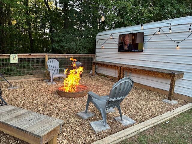 1807 30th St, Haleyville, AL 35565 - view of yard with a fire pit