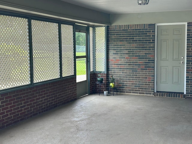 1728 Primrose Dr, Cullman, AL 35055 - spare room with brick wall