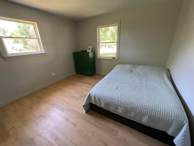 1728 Primrose Dr, Cullman, AL 35055 - bedroom featuring wood finished floors and baseboards