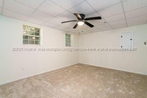 6370 Ball Rd, Mount Olive, AL 35117 - unfurnished room featuring a drop ceiling and ceiling fan