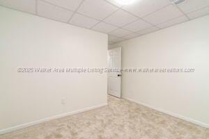 6370 Ball Rd, Mount Olive, AL 35117 - unfurnished room with a paneled ceiling and baseboards