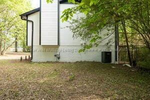 6370 Ball Rd, Mount Olive, AL 35117 - view of property exterior with central AC unit