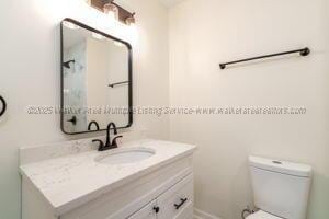 6370 Ball Rd, Mount Olive, AL 35117 - bathroom with vanity and toilet