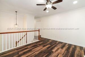 6370 Ball Rd, Mount Olive, AL 35117 - unfurnished room with wood finished floors, recessed lighting, ornamental molding, ceiling fan, and baseboards