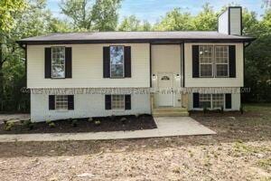6370 Ball Rd, Mount Olive, AL 35117 - raised ranch with entry steps and a chimney