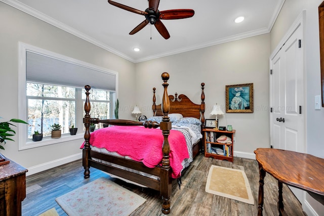 bedroom featuring recessed lighting, baseboards, ornamental molding, and wood finished floors