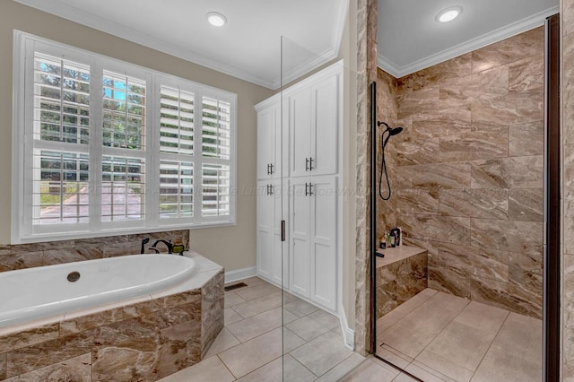 bathroom with crown molding, a tile shower, a bath, and a healthy amount of sunlight