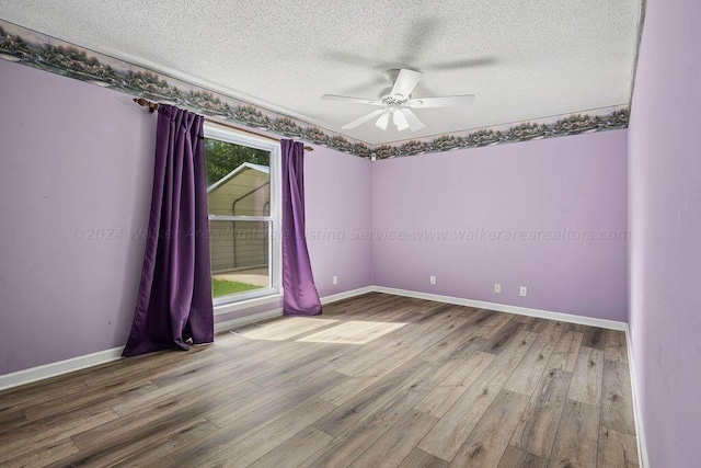 515 River Dr, Quinton, AL 35130 - unfurnished room with visible vents, wood finished floors, ceiling fan, and a textured ceiling