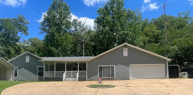 515 River Dr, Quinton, AL 35130 - single story home featuring covered porch, a garage, concrete driveway, and a ceiling fan