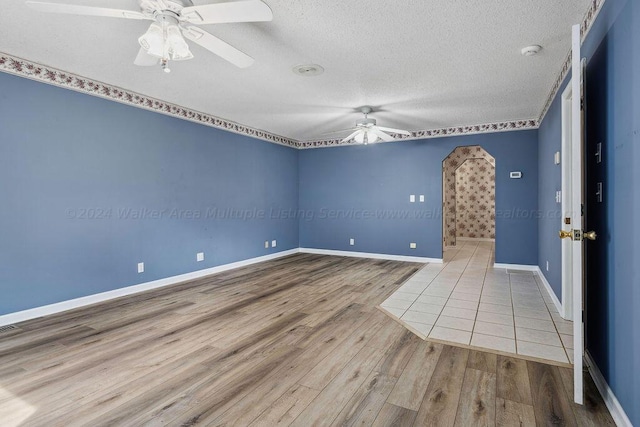 515 River Dr, Quinton, AL 35130 - spare room featuring a textured ceiling, visible vents, baseboards, ceiling fan, and wood finished floors
