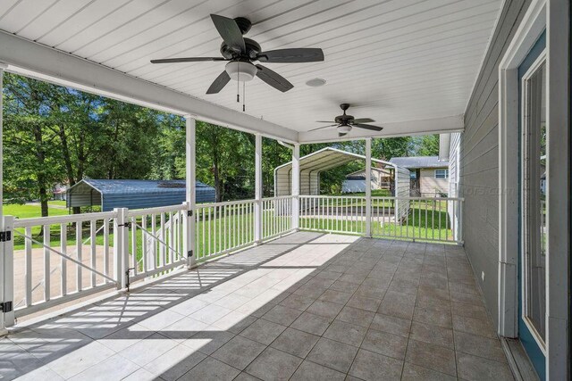 515 River Dr, Quinton, AL 35130 - view of patio featuring a shed, an outdoor structure, and a ceiling fan