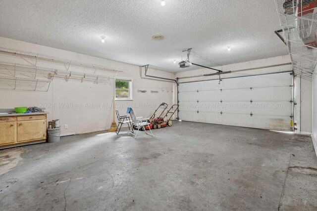515 River Dr, Quinton, AL 35130 - garage with a garage door opener