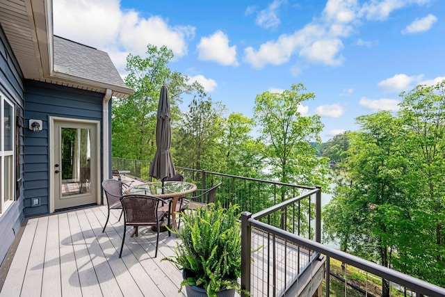 662 Sipsey Pike, Double Springs, AL 35553 - wooden terrace with outdoor dining space