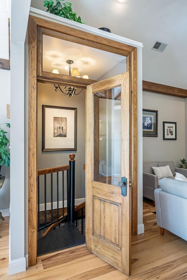 662 Sipsey Pike, Double Springs, AL 35553 - hallway with wood finished floors and baseboards