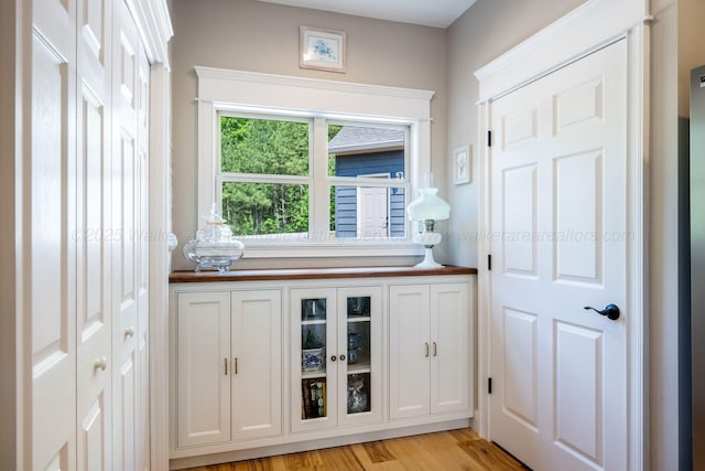 662 Sipsey Pike, Double Springs, AL 35553 - bar area with light wood-style flooring