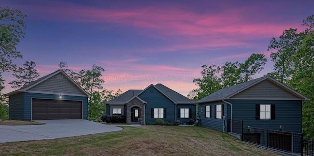 662 Sipsey Pike, Double Springs, AL 35553 - ranch-style home with concrete driveway, an outbuilding, and a garage