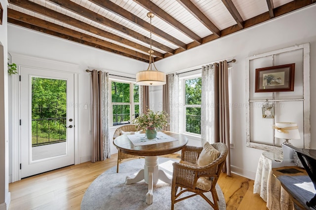 662 Sipsey Pike, Double Springs, AL 35553 - dining room featuring wood ceiling, beamed ceiling, light wood-style floors, and baseboards