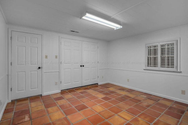 505 3rd Ave, Jasper, AL 35501 - unfurnished bedroom with a closet and tile patterned floors