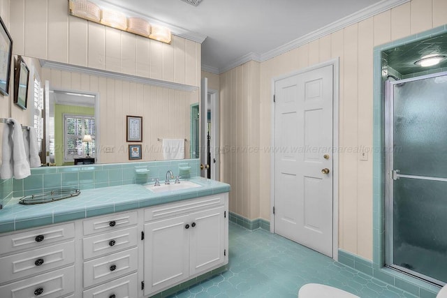 505 3rd Ave, Jasper, AL 35501 - full bathroom featuring ornamental molding, a shower stall, and double vanity